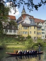 The classical trinity of Tübingen: the churchtower of the "Stiftskirche", the Hölderlin tower and the Stocherkahn punts