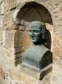 Bust of the poet in the tower wall